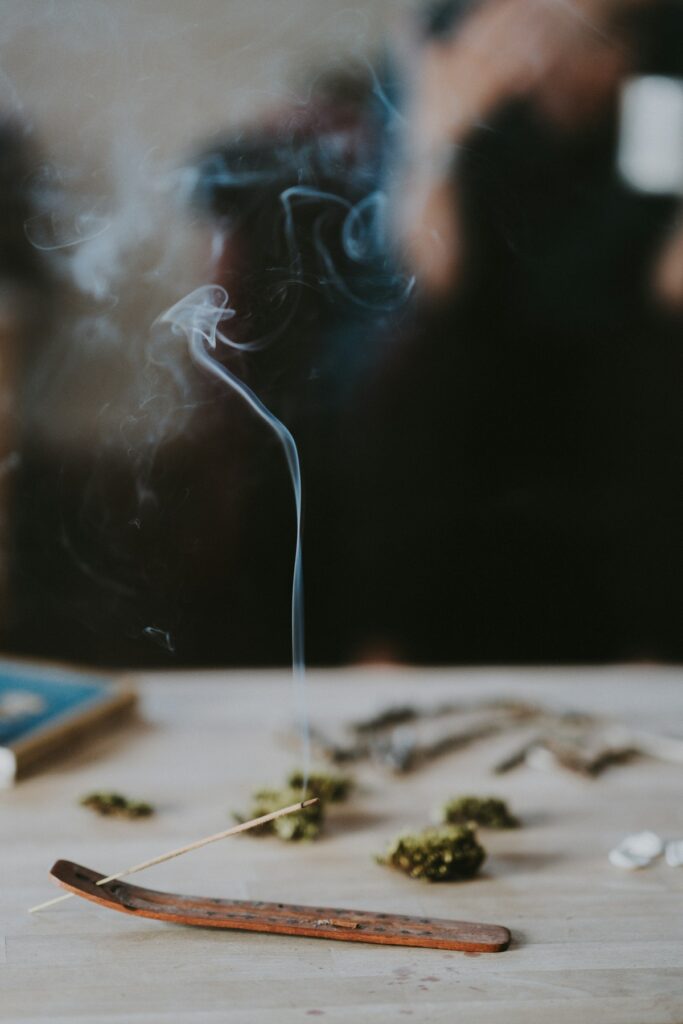 Incense stick burning.