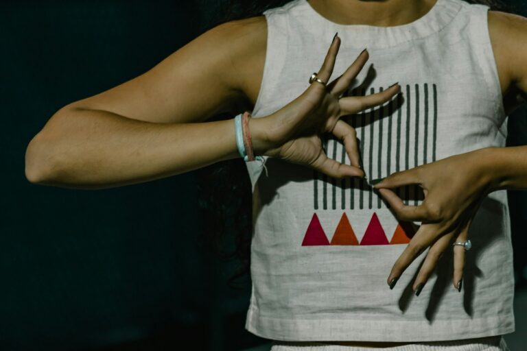 Woman performing a hand mudra.