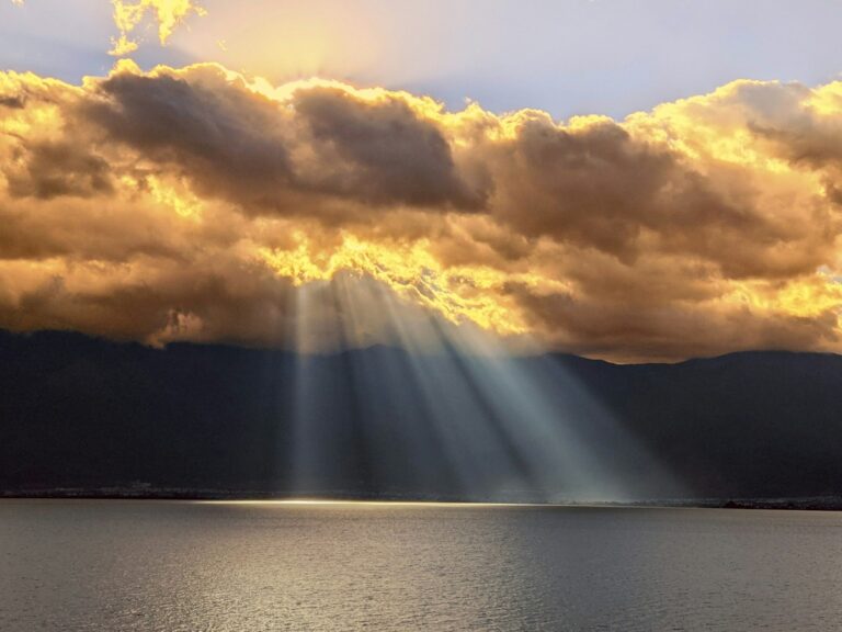 Sunbeams shinning through clouds.