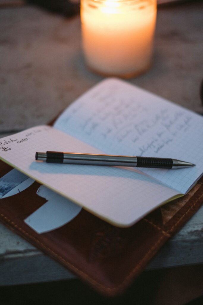 Open notebook with pen.