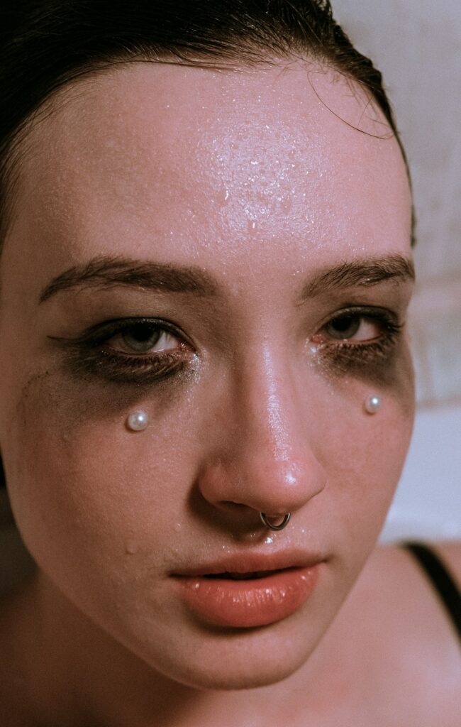 Teary eyed woman.